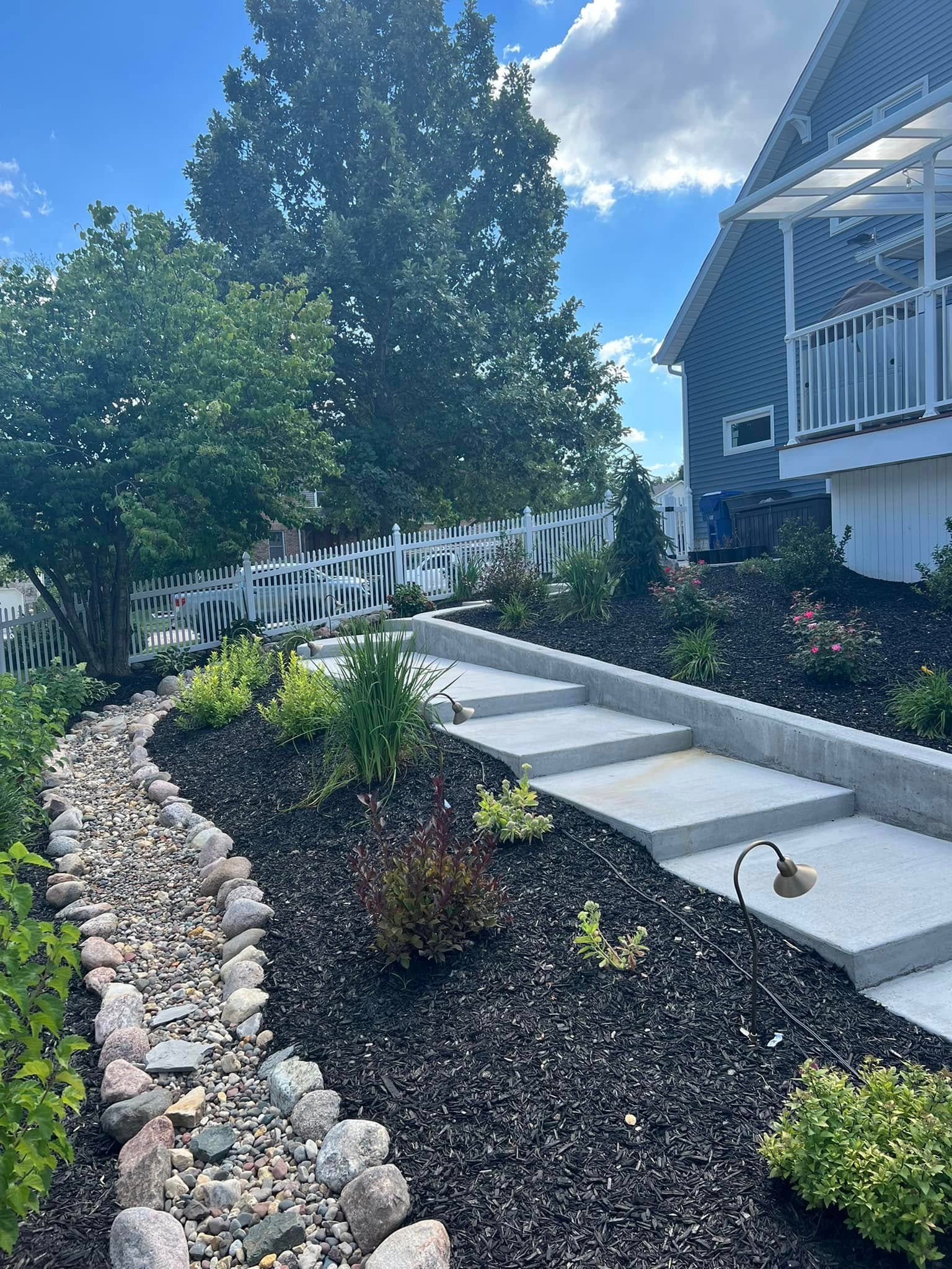 Concrete steps with landscaping